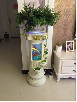 

European water fountain. Fish tank.. Waterscape feng shui wheel landing place