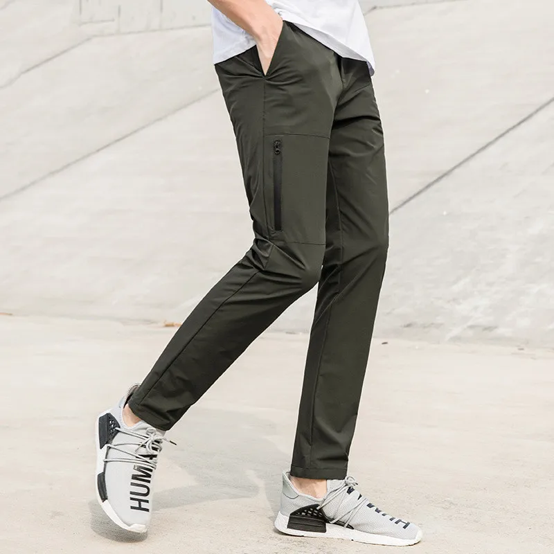 New fashion quick drying pants men brand clothing waterproof stretch trousers male quality dark