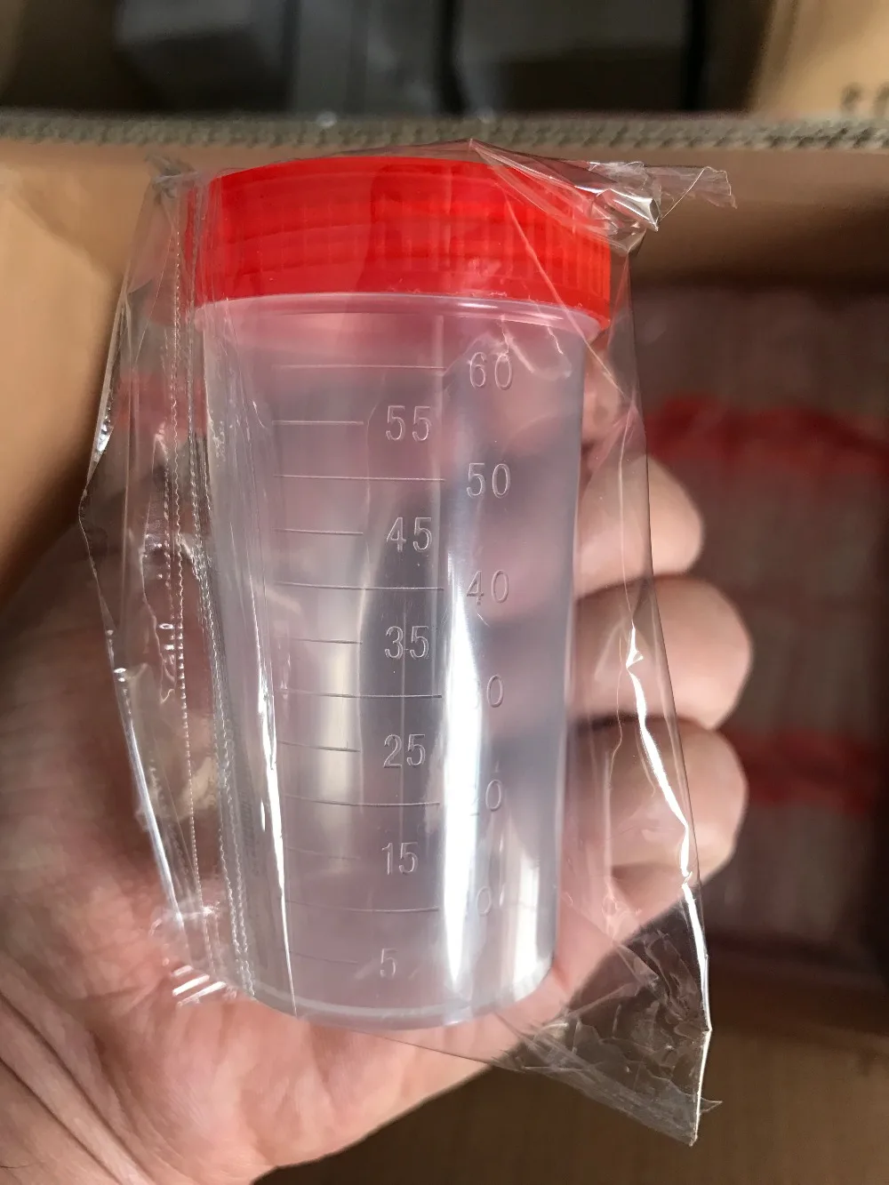 

Urine Container Specimen Cup Sample Bottle 60ml Vol, Molded Graduation ml and oz PP EO Sterile Red Cap Pack 20