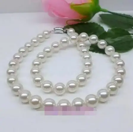 

Free Shipping >>>>> AAA 18"9-10 mm real natural south sea white pearl necklace 14k