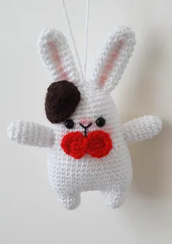 

Amigurumi doll gentlment bunny rattle toy