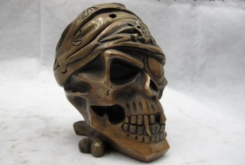 

Folk fable classical Copper Maya Kultur ghost Skull and crossbones death's-head