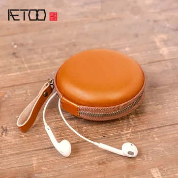 

AETOO Mobile phone charger headset pack zero wallet, first layer of leather condom storage box multi-function.