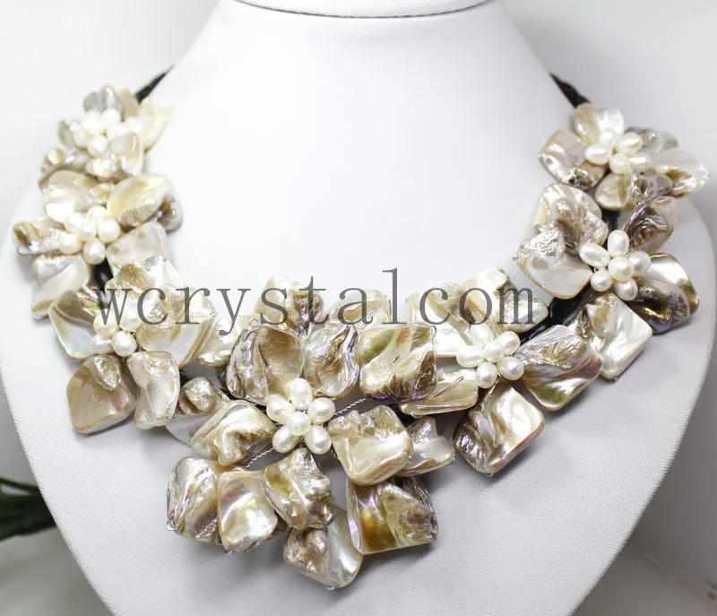 

Nice Baroque White Pearl Seven MOP Shell Flower Bib Necklace