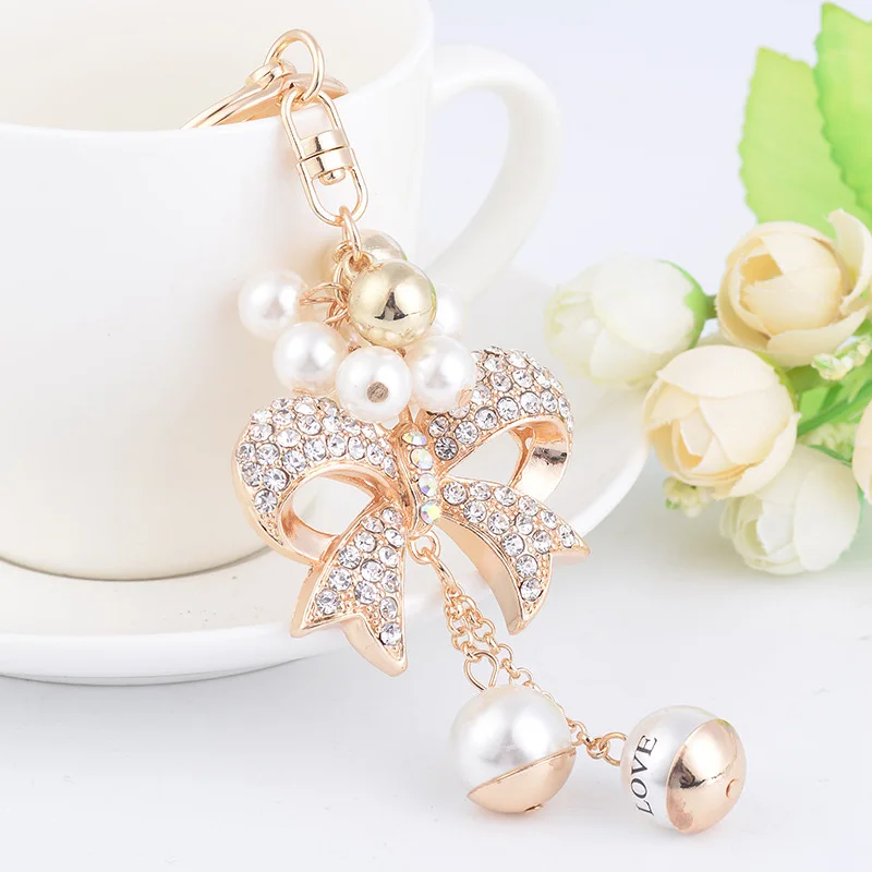 

2017 Korea Style Creative Simulated Pearl Letter Love Bowknot Shape Key Chain for Women Charm Handbag Keyrings Holder Good Gift