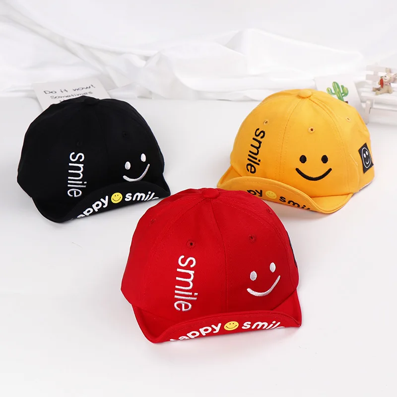 

Smiling face soft toque baby cap cotton embroidered children's hats spring new