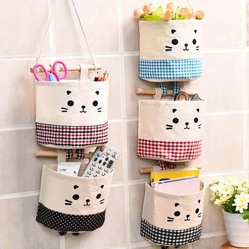 

Cotton and linen single pocket wall hanging bag Storage and finishing storage bag door behind fabric small hanging bag XI4101033