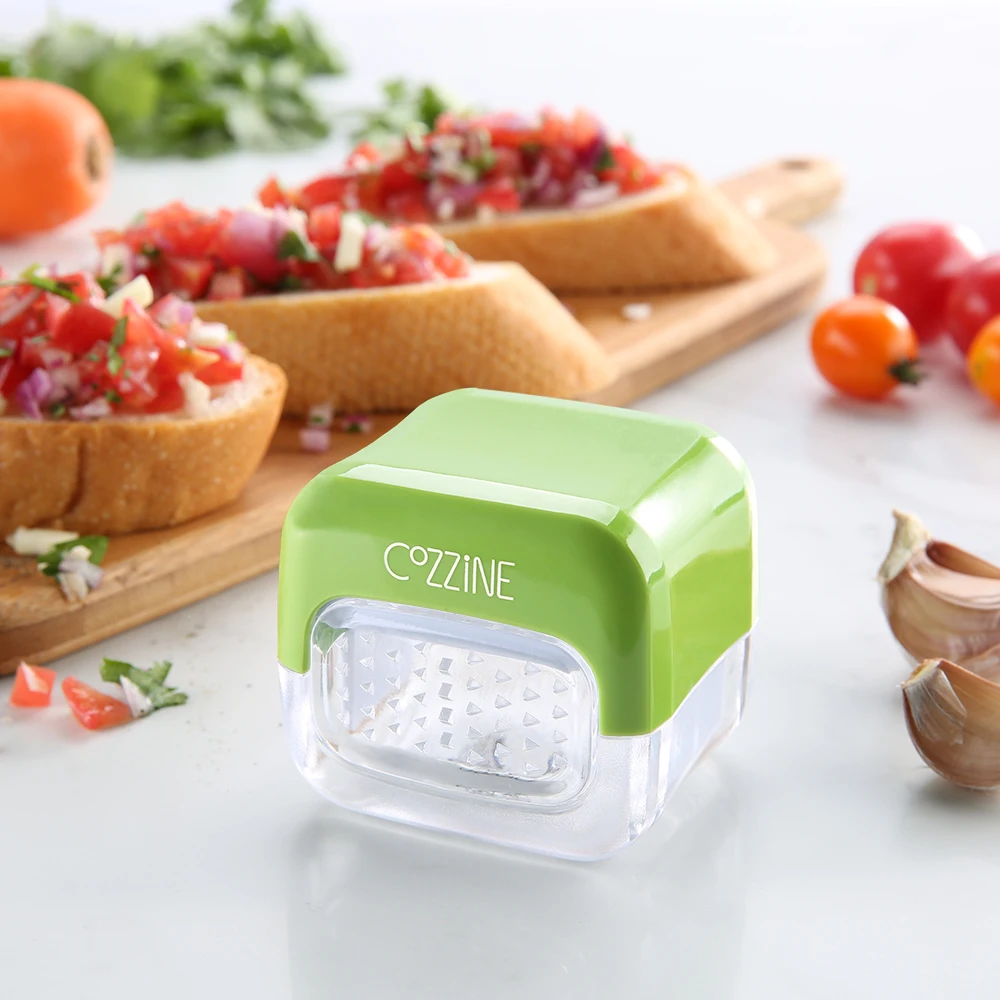

COZZINE Garlic Presser Hand Presser Mincer Onion Chopper Presser Slicer Kitchen Crusher Mincer Slicer Dicer Grater Kitchen tools