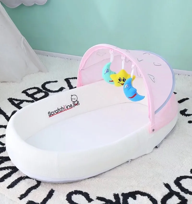 Портативная кроватка многофункциональная складная детская кровать со съемным матрасом Большой Вместительный рюкзак дизайн бионическая кровать для новорожденных - Цвет: Розовый