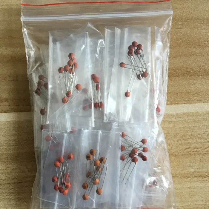 

1bag/lot Ceramic Capacitor Package Inline Capacitor 2pf-0.1UF 30 kinds Each 10 Ceramic Tiles Sample Bag connector