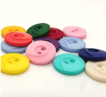 

Free shipping!Two holes Laser color button top grade Matte sweater button 15MM DIY Accessories
