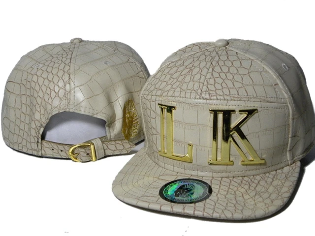 gold bucket hat tyga