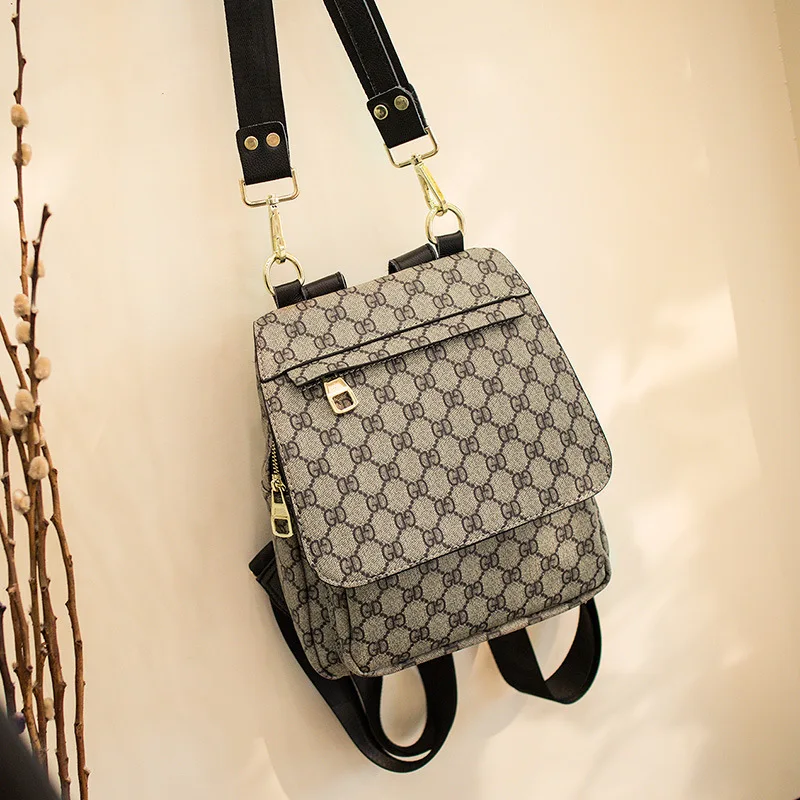 

The stylish GD printed women's backpack is simple and versatile for large capacity travel backpack