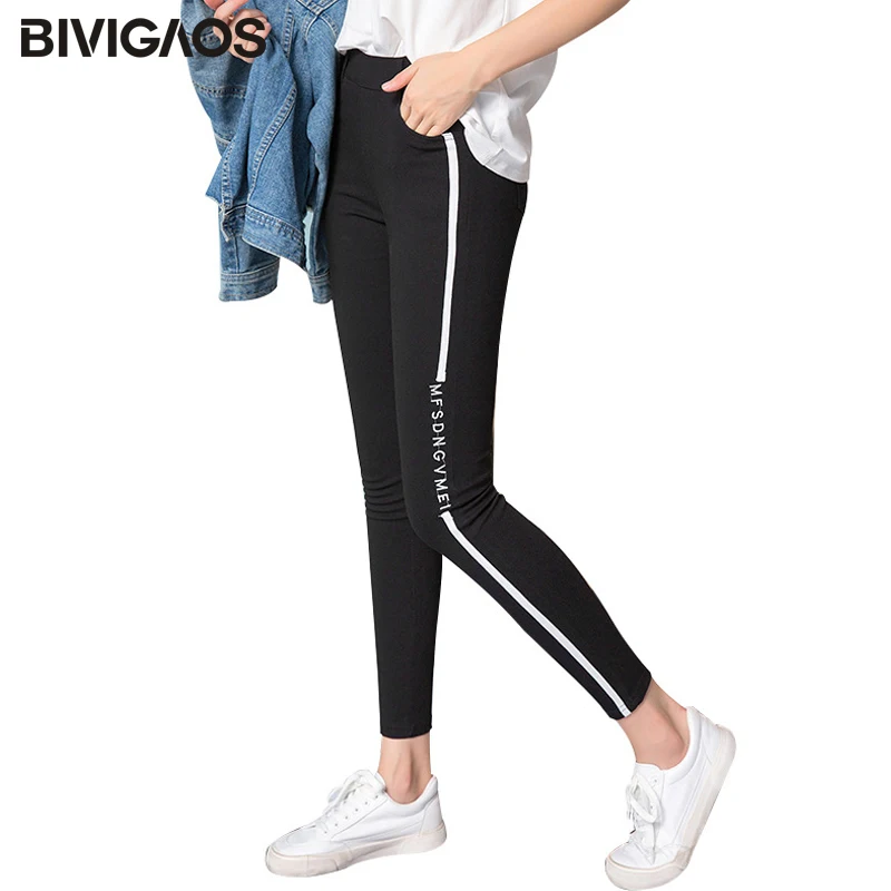 

BIVIGAOS Fall New Plus Size Slim Black Leggings Side Vertical Striped Letters Embroidery Elastic Ninth Pencil Pants For Women