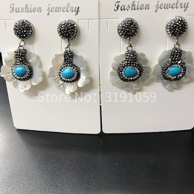 

Beautiful Daisy shell earrings with elegant and long style European and American female earrings