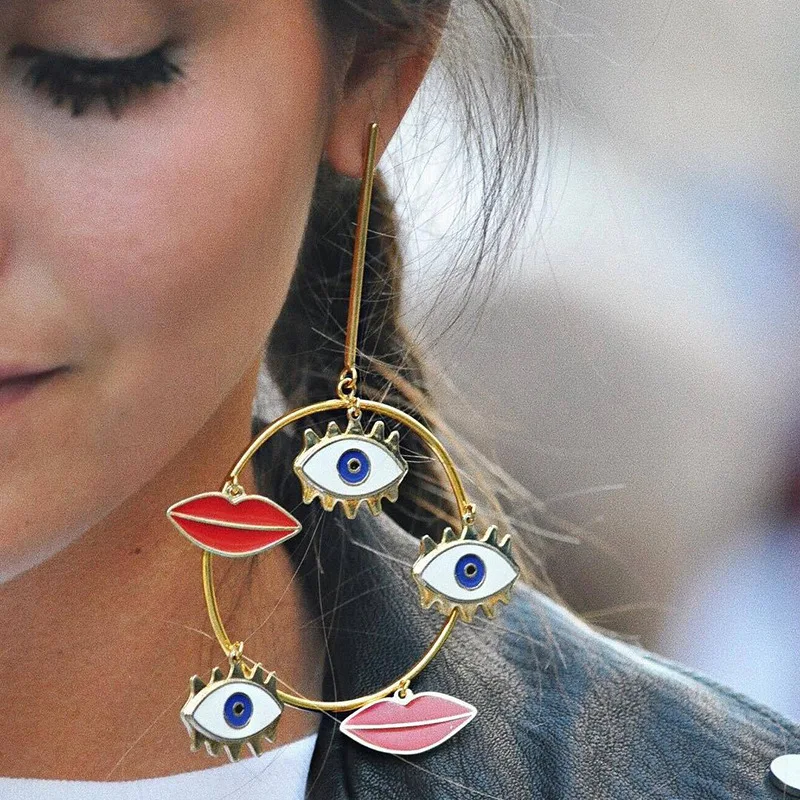 

2019 New Design Exaggerated Long Big Evil Eyes Lips Charm Gold Loop Dangle Earrings For Women Bohemian Gold Statement Earring