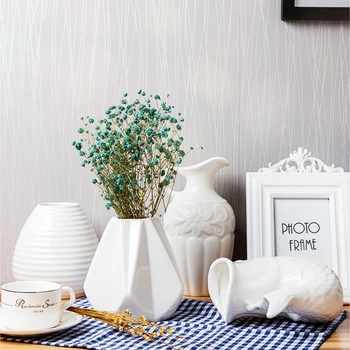 

Modern Stylish Geometric Ceramic Vase Home Decoration White Flower Vase European fish shaped milk bottle vase