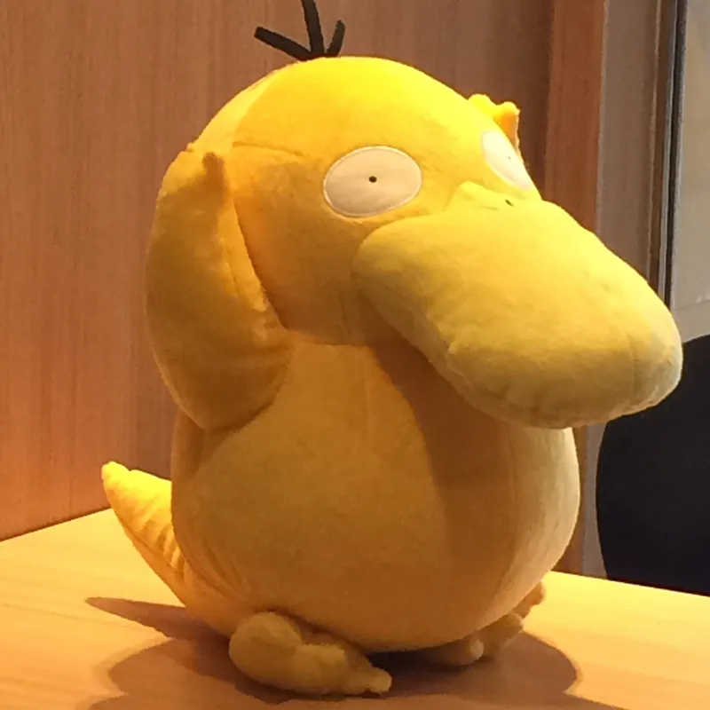 

Anime Games Pikachu series new 38CM Psyduck plush toy Swire armor stuffed toys A birthday present for children Christmas gift