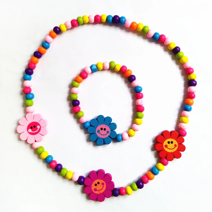 Новые эластичные веревки детское ожерелье из деревянных бусин браслет улыбающийся цветок сочетание окружающей среды красивые подарки 12 компл./лот