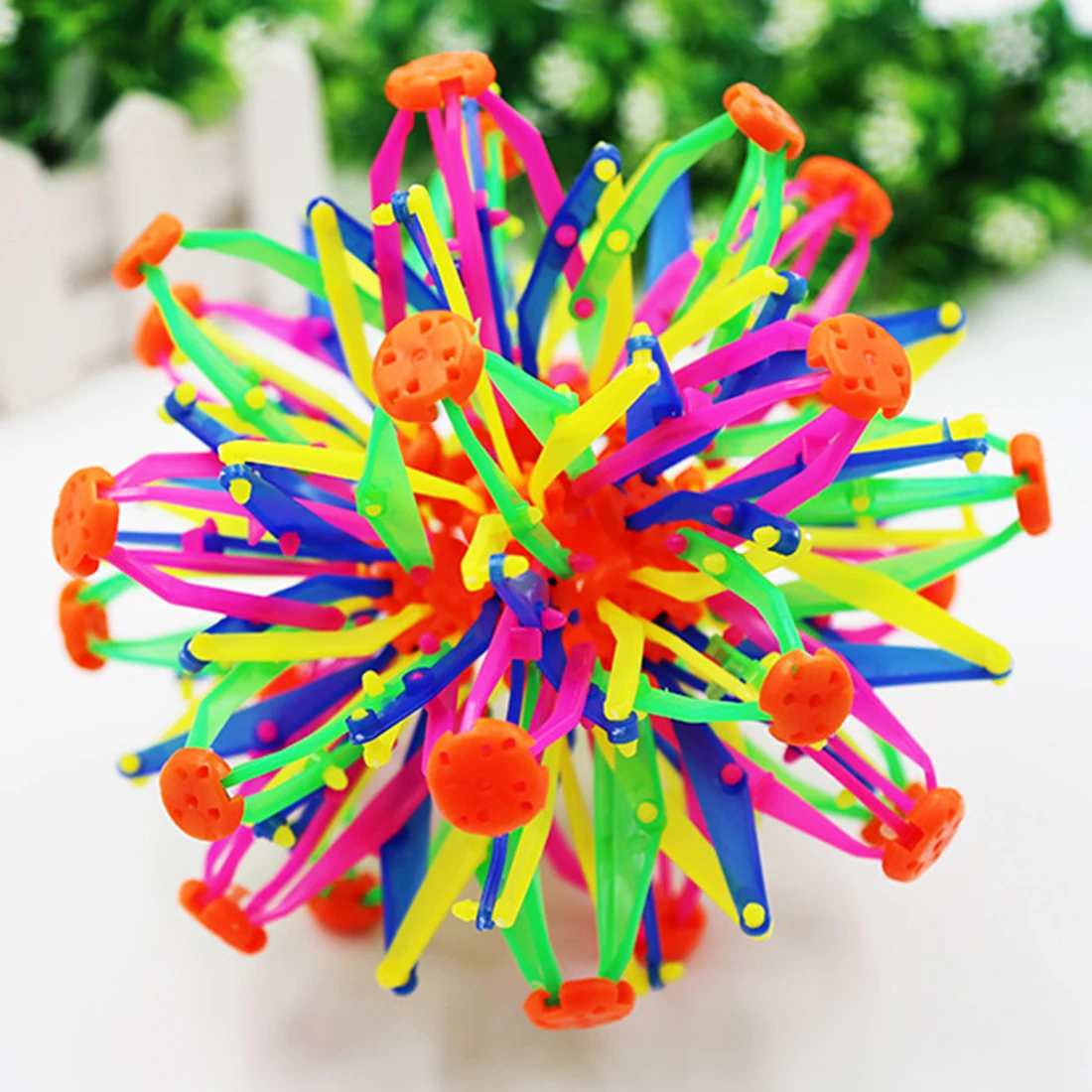 

Baby Kids Toys Fun Retractable Changeable Magic Ball Hand Catch Training Ball Colorful Flower Ball Creative Gifts Fall Resistant