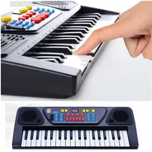 2017 New Children ‘s electronic organ toys with microphone infants teaching baby instruments education music toys