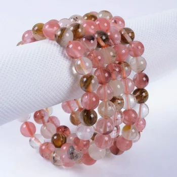 

Wholesale 5PCS 8mm Fashion Volcano cherry quartz round beads stretchable bracelet 7.5"
