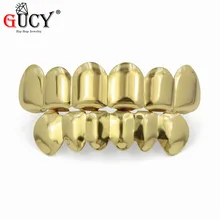 GUCY цвета: золотистый, Серебристый покрытием хип-хоп ЗУБЫ Grillz шапки верхней и нижней гриль набор с силиконовым Зубы вампира ювелирные изделия подарок для рождественский