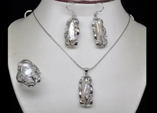 

Free shipping New style Natural noble jewelry>>>>Natural White Biwa Pearl Pendant Necklace 17'' Earring Ring Set