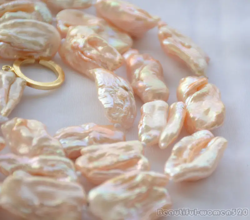 

A 26mm PINK BAROQUE KESHI dens REBORN PEARL NECKLACE 34inch