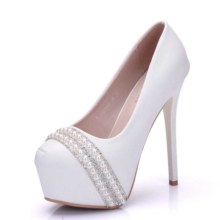 white pumps with platform