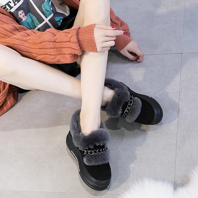 

2018 fur one snow boots winter new thick bottom leather rabbit fur sponge cake wild cotton shoes increased.