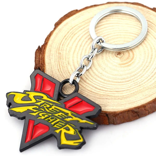 

The Street Fighter 5 Red Yellow Logo Metal Key chain RYU KEN CHUN LI Charlie GUILE Pendant KeyChain Chaveiro Key Ring DJ56