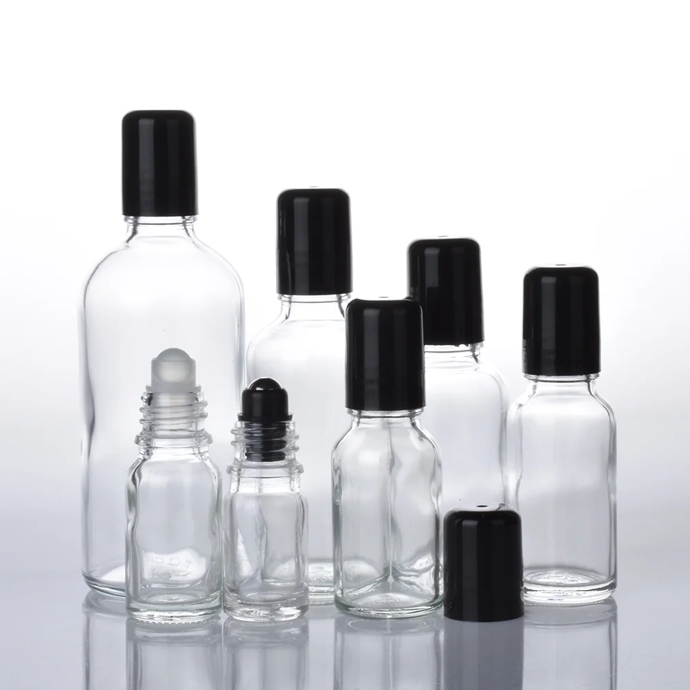 

12pcs/lot 5ml 10ml 15ml 20ml 30ml 50ml 100ml Empty Clear Glass Essential Oil Bottle With Black Metal Rollon Cosmetic Container