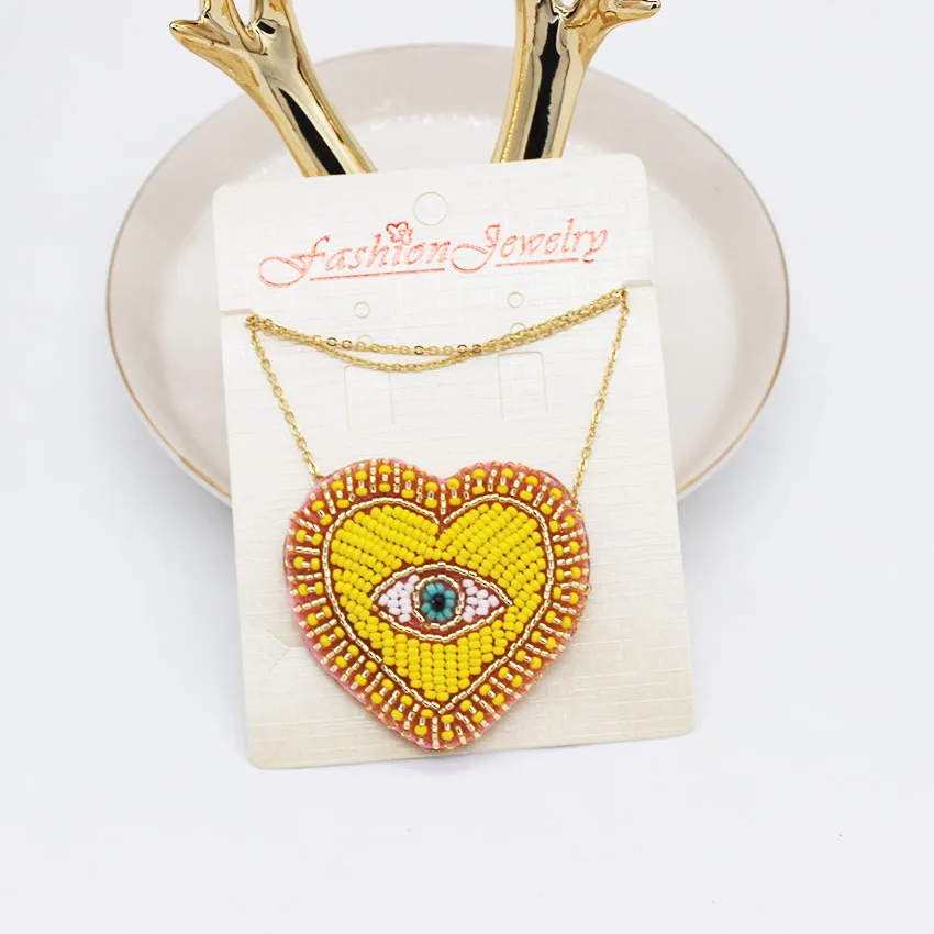 

New Bohemian Rhinestone Rice Beads Heart Eye Necklace Fashion Personality Wild Necklace