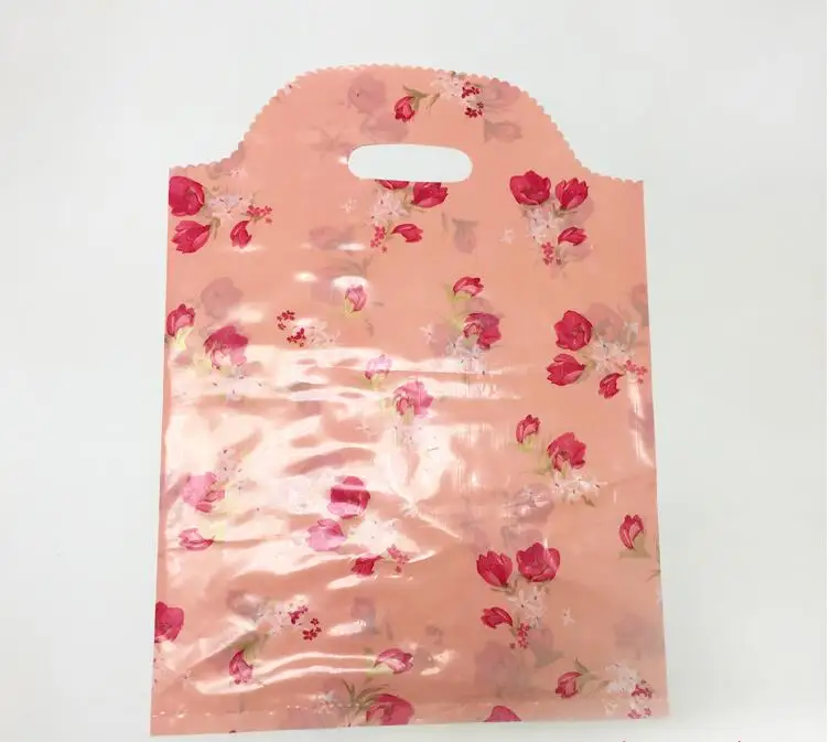 

4 sizes 45pcs Pink rose plastic gift bag handles,personalized gift plastic boutique plastic shopping bag with handle wholesale