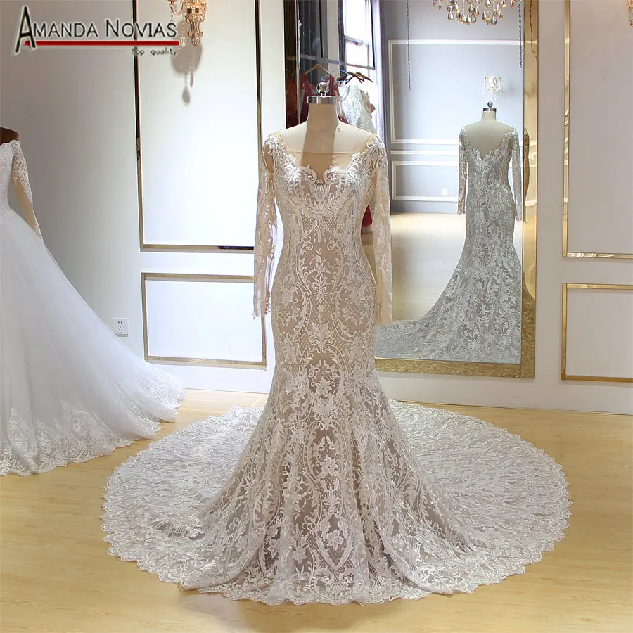

Long sleeves mermaid wedding dress champagne