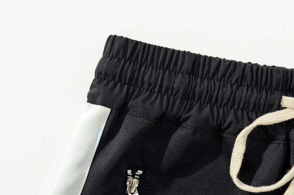 Wycbk Бибер удлиняется разделе штаны Для мужчин в западном стиле ретро хип-хоп брюки боковой молнии хит Цвет унисекс Повседневные штаны