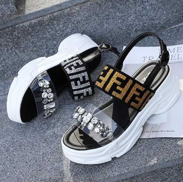 

Thick-soled sandals letters transparent rhinestones summer Korean version of the new slope with ladies in the 5.5cm sandals C130