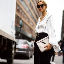 2019 Spring European American Street Shooting Seiko V Collar Lapel Black Wrap Edge White Shirt Fork Wide Sleeve Chiffon Shirt 2019 Spring European American Street Shooting Seiko V Collar Lapel Black Wrap Edge White Shirt Fork Wide Sleeve Chiffon Shirt