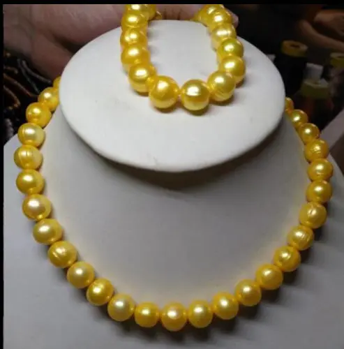 

Free Shipping >>>>>HOT AAA HUGE 11-12MM SOUTH SEA GENUINE GOLDEN PEARL NECKLACE 18" + BRACELET 7.5c