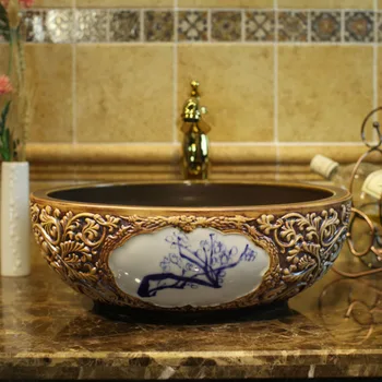 

China Artistic Handmade Engraving Ceramic wash basin Lavobo Round Countertop handmade ceramic sinks