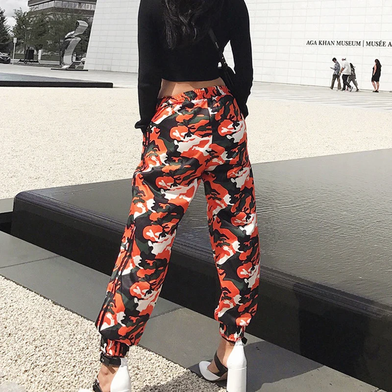 camo pants with orange stripe