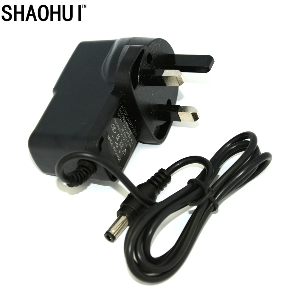 

SHAOHUI 100pcs 5.5mmX2.5mm Compatible 2.1mm AC 100V-240V High quality DC 9V 1A Power Adapter Supply UK plug Free shipping