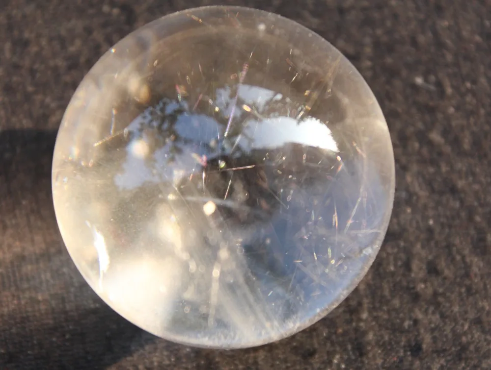 

Natural rutilated quartz crystal ball