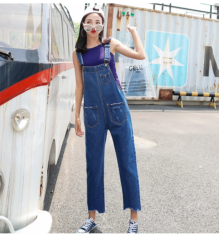 Stylish suspender jeans. College style, casual denim pants. (29)