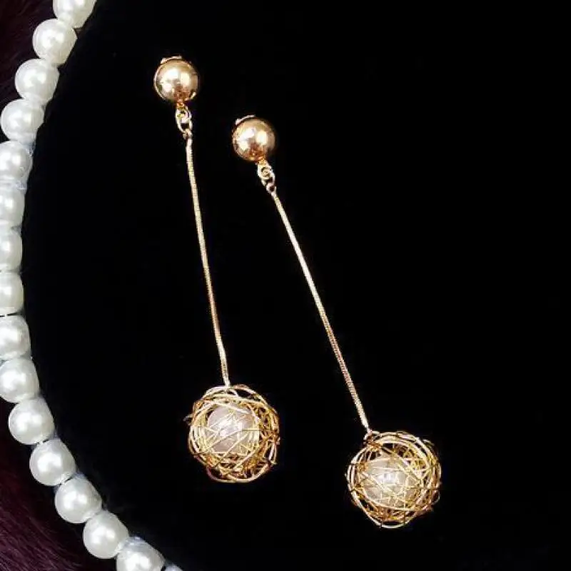 

Hollow Gold Skein Pearl Earrings Temperament Long Pendant Personality Exaggerated Tide Net Red Earrings For Women Oorbellen