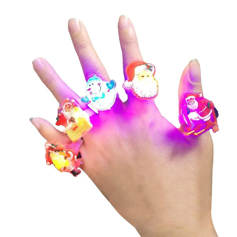 

Christmas Santa Claus Ring Cartoon Glowing LED Luminous Finger Rings Jewelry for Kids New Year Children's Day Gift Random Style