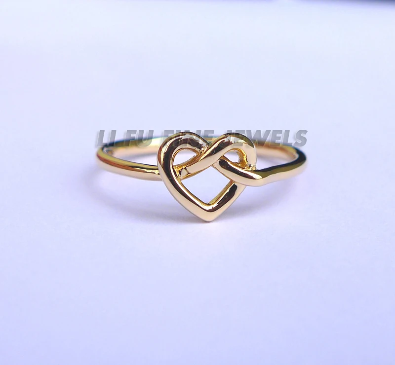 

Solid Yellow Gold Infinity Knot Heart Ring