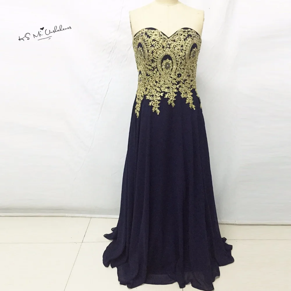 Abito cocktail oro africa