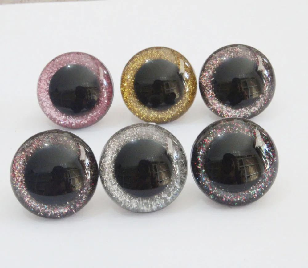 

50pcs/lot 26mm-28mm-30MM-40MM round shape clear plastic safety toy eyes +glitter fabric+ hard washer size& color option --N6